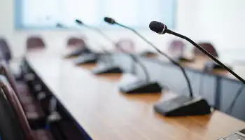 series of microphones on a table