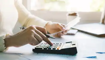 person using a calculator