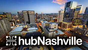 Aerial cityscape of Nashville skyline at dusk with illuminated buildings and hubNashville logo overlay.