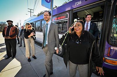 Mayor exiting a city bus