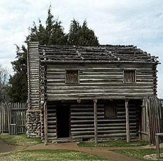 Photo of an old log cabin building at Fort Nashborough