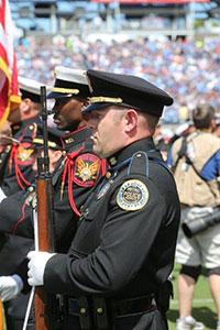 Metro Police rifleman standing with rifle