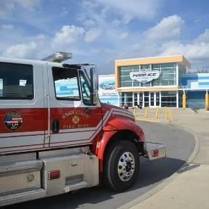 Fire Truck in Front of Ford