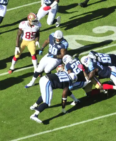 football play on Nissan Stadium field