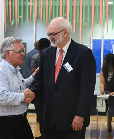 Mayor Greeting Meeting Participant