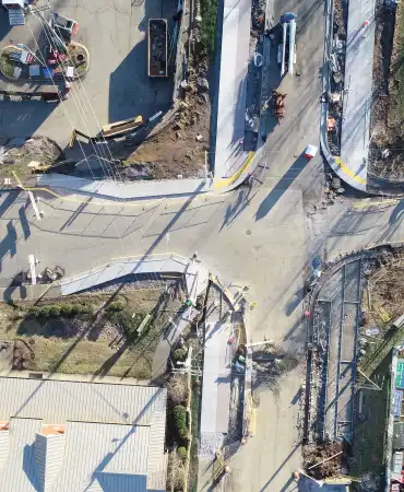 Phase 2 streetscaping at Madison Street and Madison Station Blvd. Poured sidewalk at the north and southwest intersection.