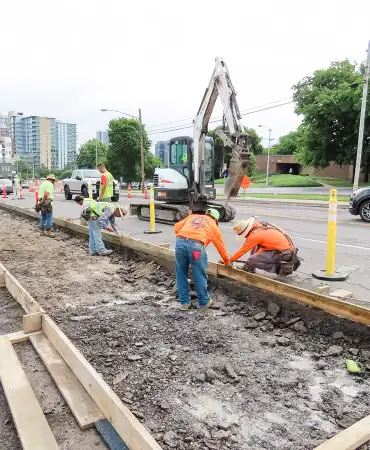 Preparing to pour concrete for bus boarding island on 12th Avenue South at South Street.