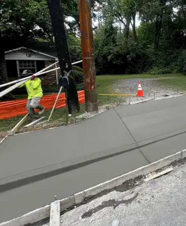 New concrete driveway, sidewalk, curb and gutter poured on Hobbs Road