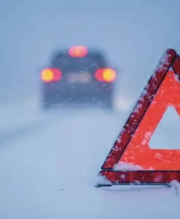 Photo of snow covered road 